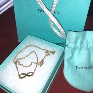 Tiffany and co 18k gold infinity pendant necklace